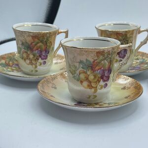 Set of 4 Limoges teacups and saucers.